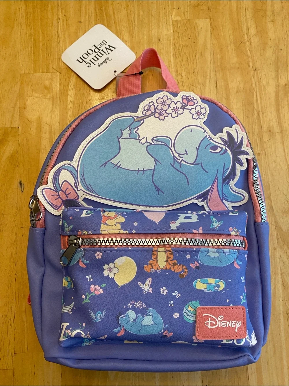 Disney Purple & Pink Eeyore Mini zippered Backpack w front pouch. NWT